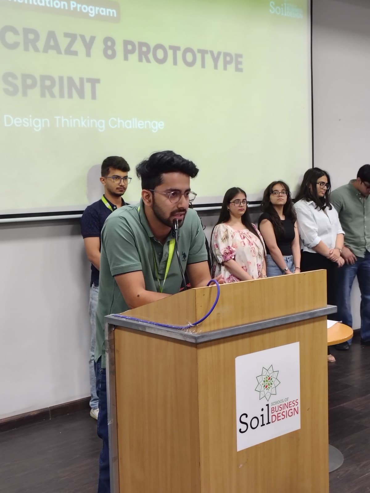 A student pitching at the SOIL design thinking challenge